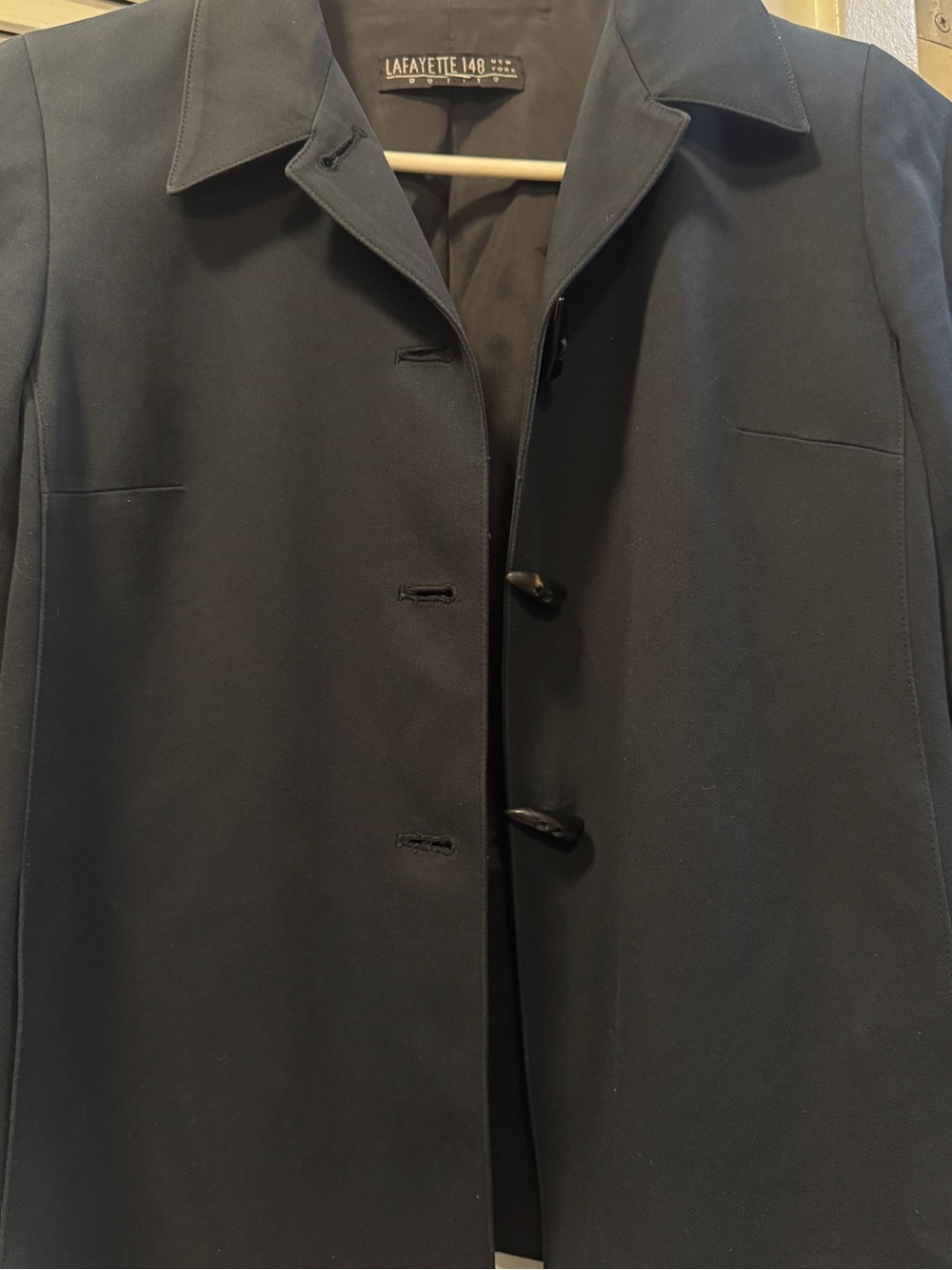 Vintage Lafayette 148 New York navy blue tailored jacket in size 4 Petite.
